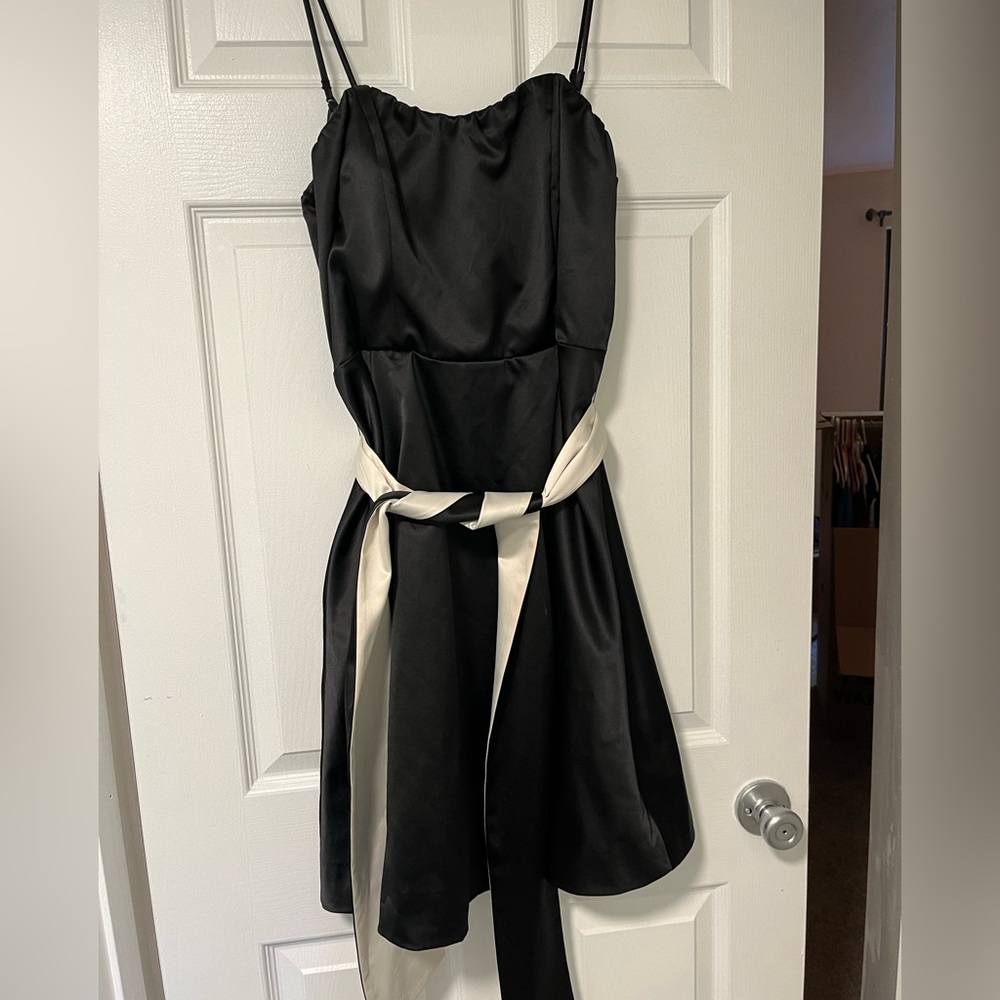 Super cute satin black dress with white and black belt and removable straps